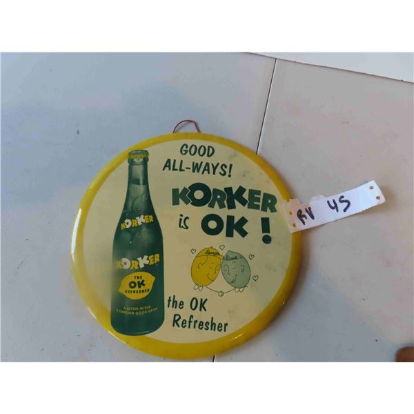 Korker on Cardboard Tin Round Sign 9'' Across