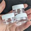 Image 1 : Lot of 21 Small Acrylic Jars With Screw On Lids