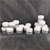 Image 2 : Lot of 21 Small Acrylic Jars With Screw On Lids