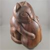 Image 1 : Wooden Carving of Woman and Cat Embrace