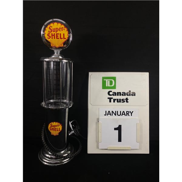 Super Shell Liquor Dispenser. Approx. 19" H & TD Canada Trust Calender