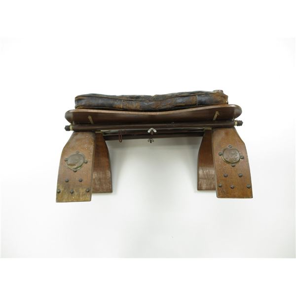 ANTIQUE CAMEL SADDLE FOOT STOOL