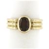 Image 1 : 14K Yellow Gold 1.30 ctw Bezel Set Oval Garnet Solitaire Grooved Wide Band Ring
