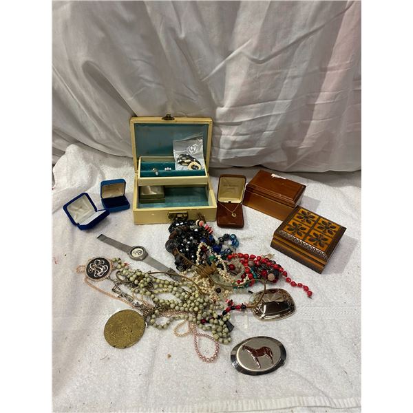 Assorted costume jewellery, belt buckles etc