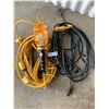 Image 1 : Assortment of Extension Cords and Work Light