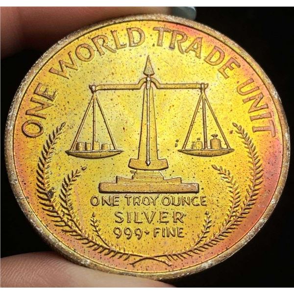 Toned 1984 World Trade Eagle One World Trade Unit 1 ozt .999 Silver
