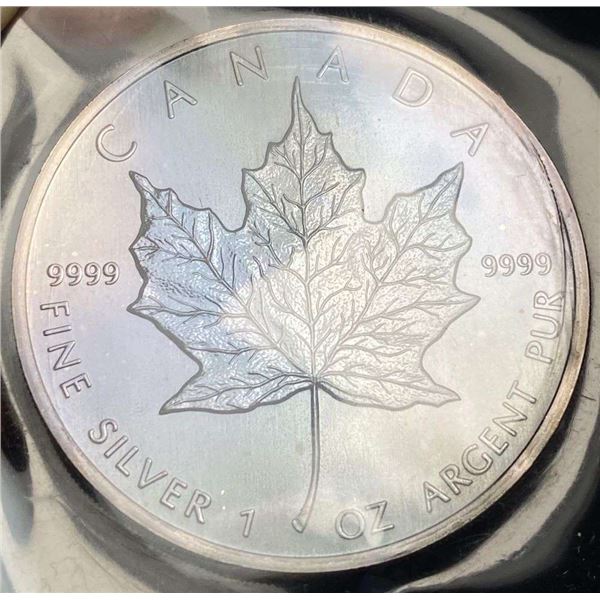 Toned 1989 Canada $5 Maple Leaf 1 ozt .9999 Silver