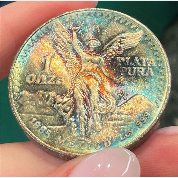 Toned 1985 Mexican Libertad 1 ozt .999 Silver