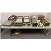 Image 1 : Table lot full of assorted items - includes Portable filebox / wallmount flood lights / control pane