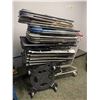 Image 1 : Large group of folding chairs w/ shopping cart
