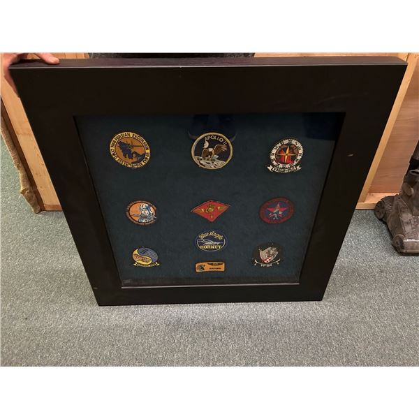 Framed Military badges wall hanging (approx. 31 1/2in x 32in)