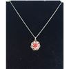 Image 1 : 20)  RUBY RED CRYSTAL SET IN A FLOWER PENDANT ON