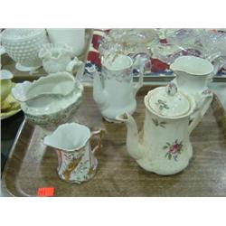 CREAMERS AND TEA POTS