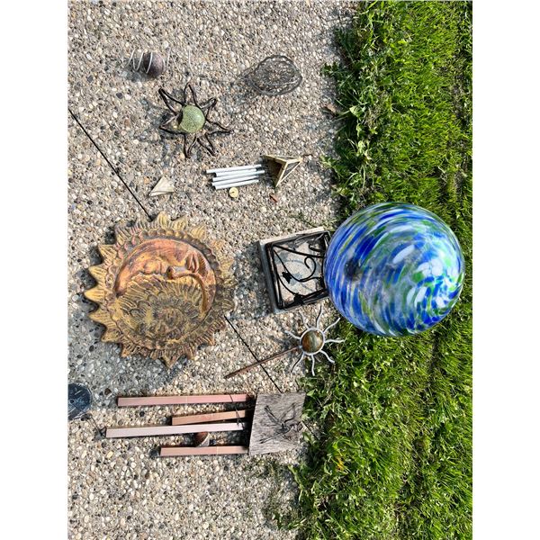 Assortment of Wind Chimes and Lawn Decor