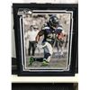 Image 1 : MARSHAWN LYNCH SIGNED AND CUSTOM FRAMED 20 X 24 DISPLAY (LYNCH COA)