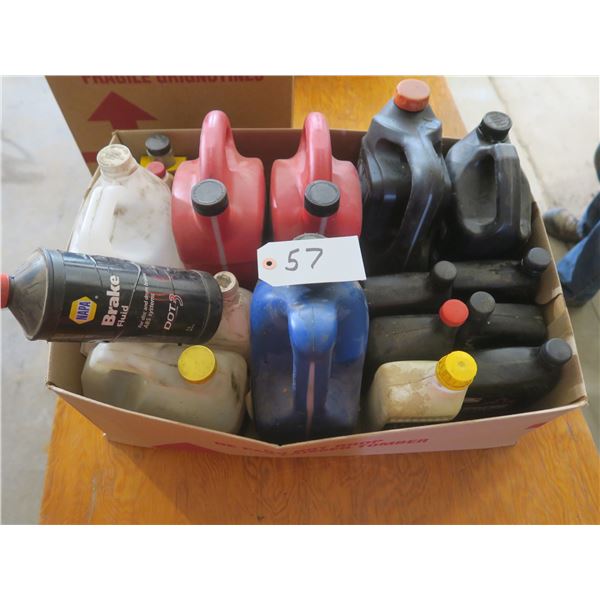 Box of assorted Automotive fluids: Motor oil, brake fluid, etc.