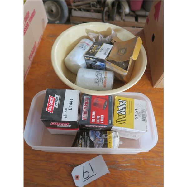 2 Plastic bins of automotive filters, etc.