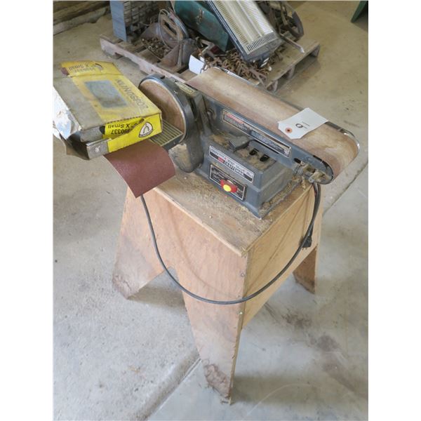 Craftsman 4” Motorized belt sander on wooden platform with Sanding belts/discs