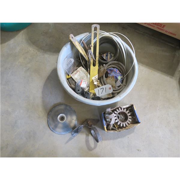 Plastic tub of assorted parts, tools, zip ties, etc.