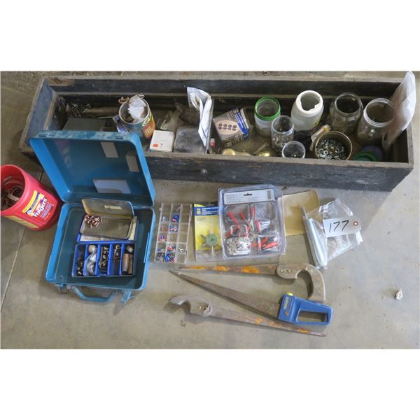 Wooden box of with contents: Assorted clamps, nuts/bolts, metal Makita case, 3 hand saws, etc.