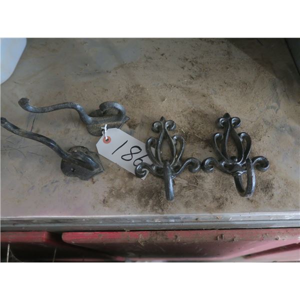 Lot of Cast ornate wall hanging coat hooks (2 pairs of different styles)