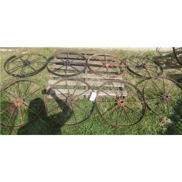 2 Pairs of 4 metal tires – welded – 25.75” diameter