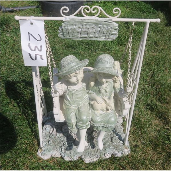Cute Boy & Girl sitting on a swinging bench lawn ornament -14”x 20.5”