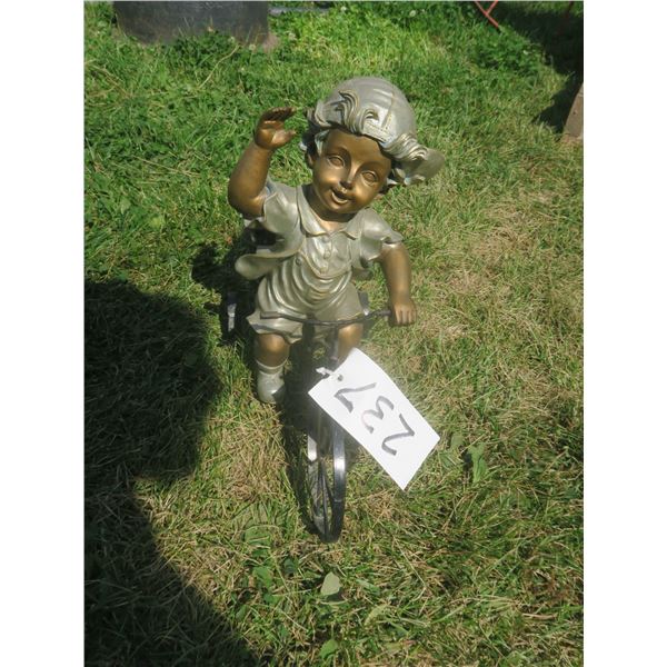 Boy riding a bicycle lawn ornament – 15”x 16”