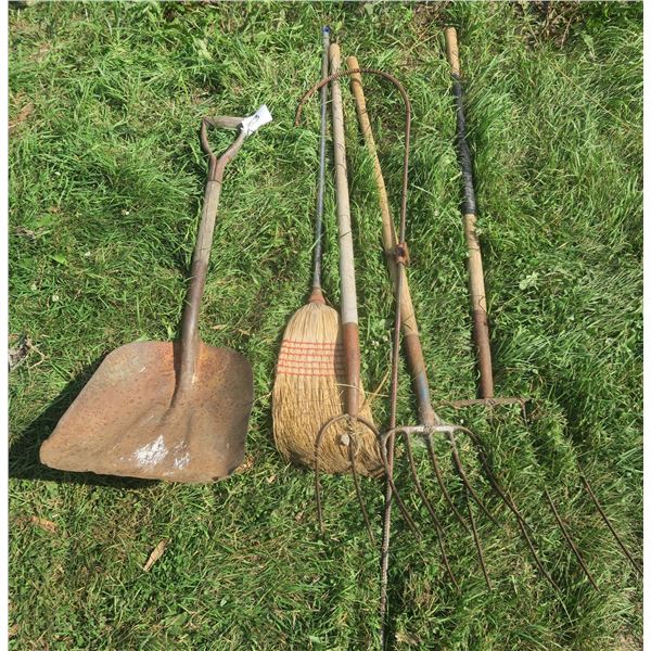 Lot of Hay rakes, shovels, flower plant/pot holder, etc.