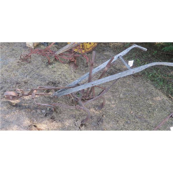 Antique horse drawn hand plow - metal and wood