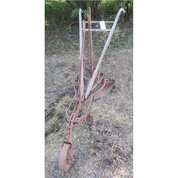 Antique horse drawn hand plow - metal and wood