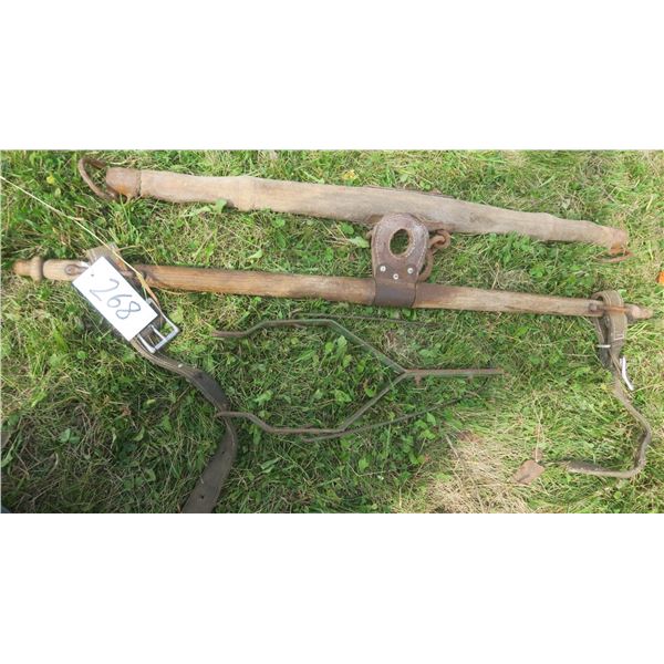 2 horse yokes (1 has straps) 4ft long & 42"Long