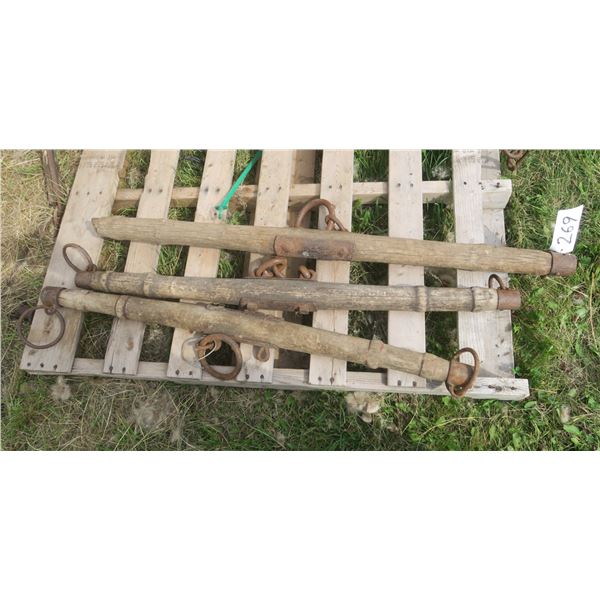 3 horse yokes (1 has a damaged end) 41" to 45" long