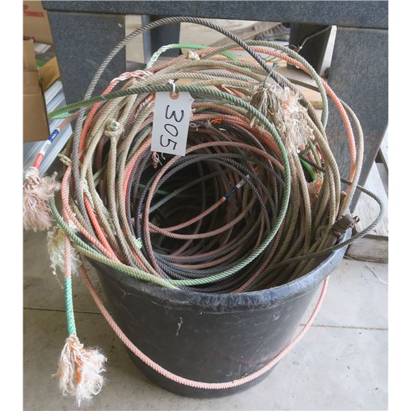 Large plastic tub of horse rope, etc.