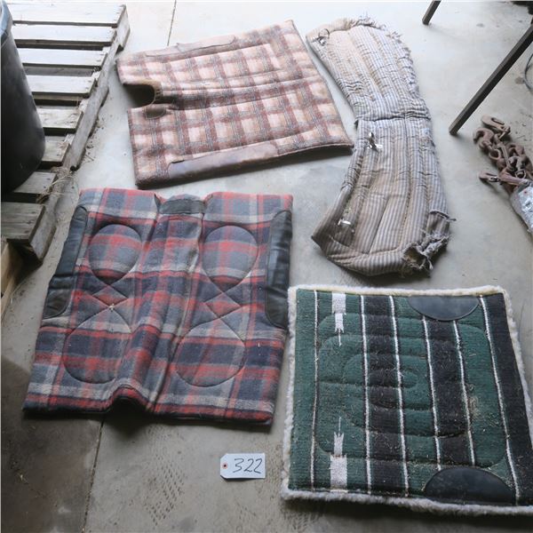 Box of assorted horse riding blankets