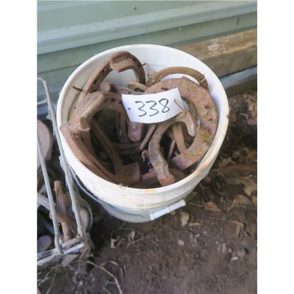 5 gallon Bucket of horse shoes