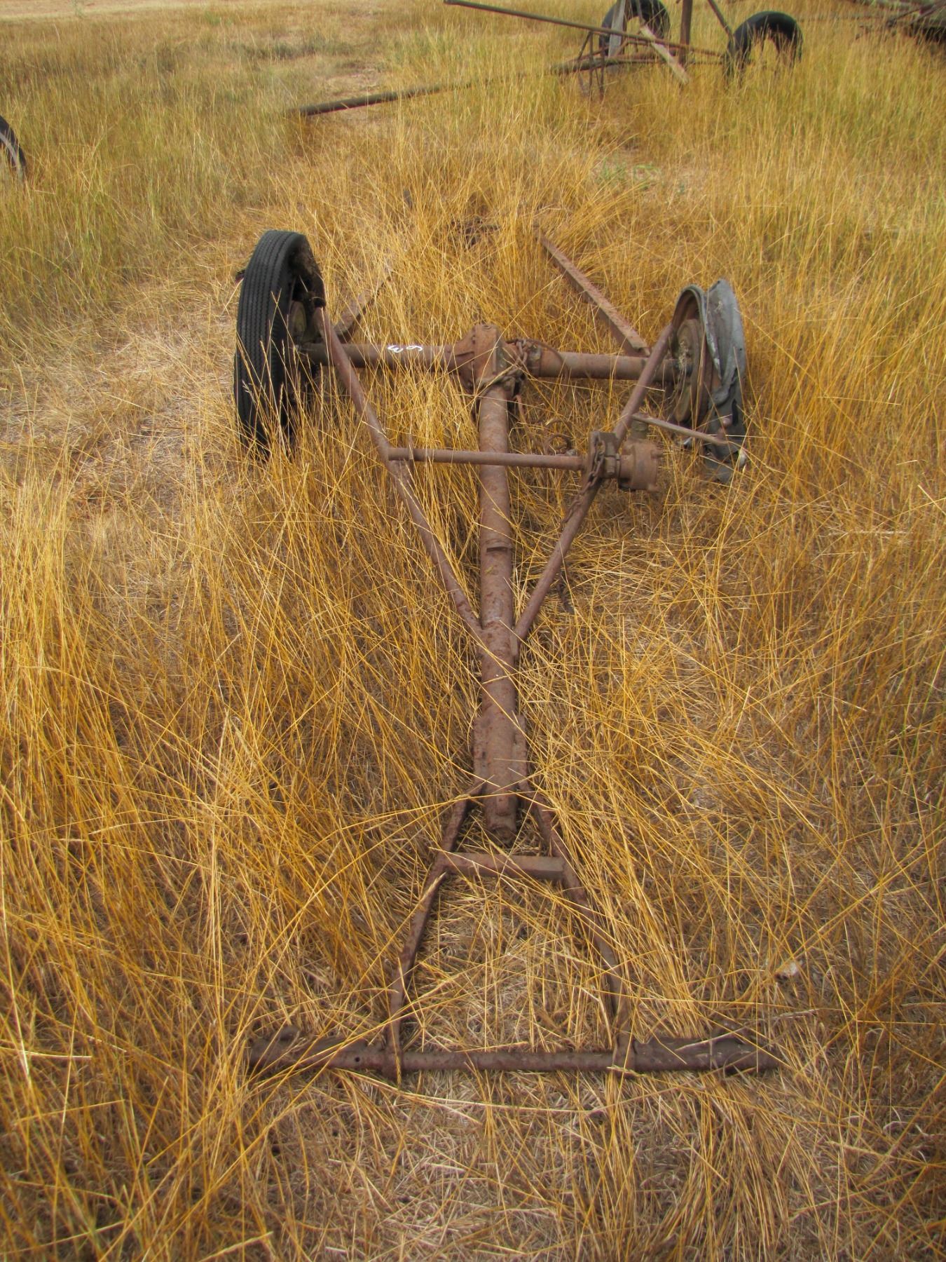 Axel with miscellaneous frame attachment