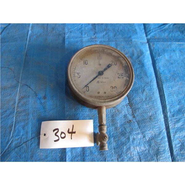 Possibly steam engine gauge