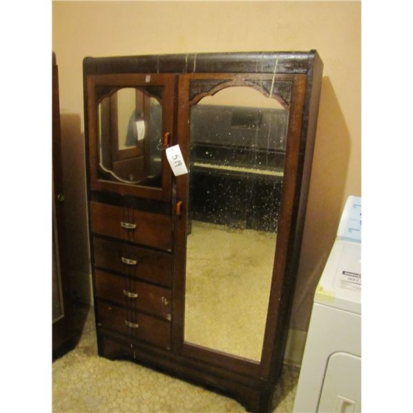 Waterfall front wardrobe with mirrored doors and four drawers bakealite