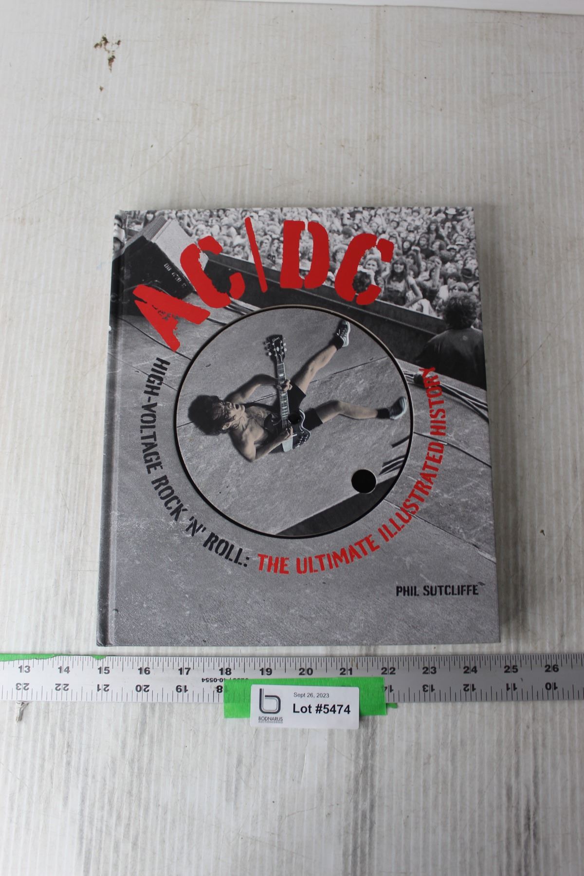 AC/DC Illustrated History Book - Bodnarus Auctioneering