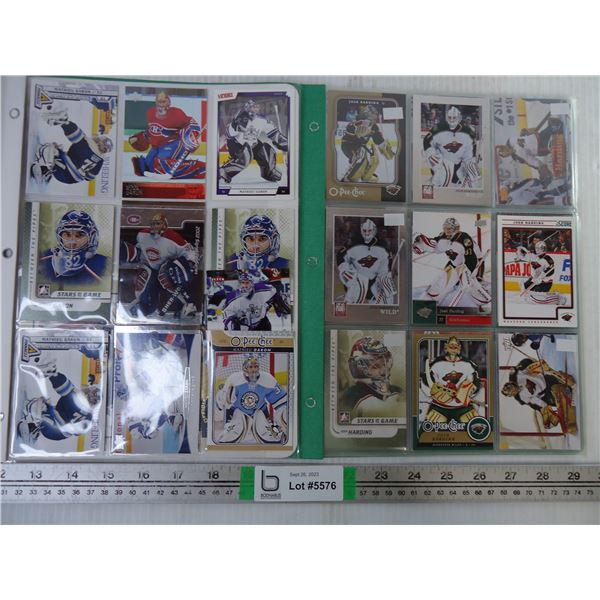 (2) Folders of NHL Cards Featuring Josh Harding and Mathieu Garon