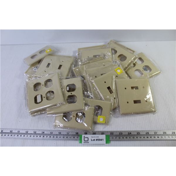 Lot of Almond Light Switch & Plug-in Covers