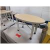 Image 1 : 3 Oval Side Tables On Wheels
