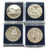 Image 1 : 1986-1989 Commemorative Brilliant Uncirculated Dollars in Square Capsules. 4pcs. 