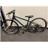 Image 2 : TREK BLACK 24 SPEED MOUNTAIN BIKE WITH FULL DISC BRAKES ( TIRE NEEDS TO RESET )