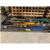 Image 1 : SHELF OF ASSORTED LARGE TOOLS, AXES, SLEDGE HAMMERS, TRIMMERS, & YARD TOOLS