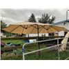 Image 1 : 2 BEIGE PATIO UMBRELLAS