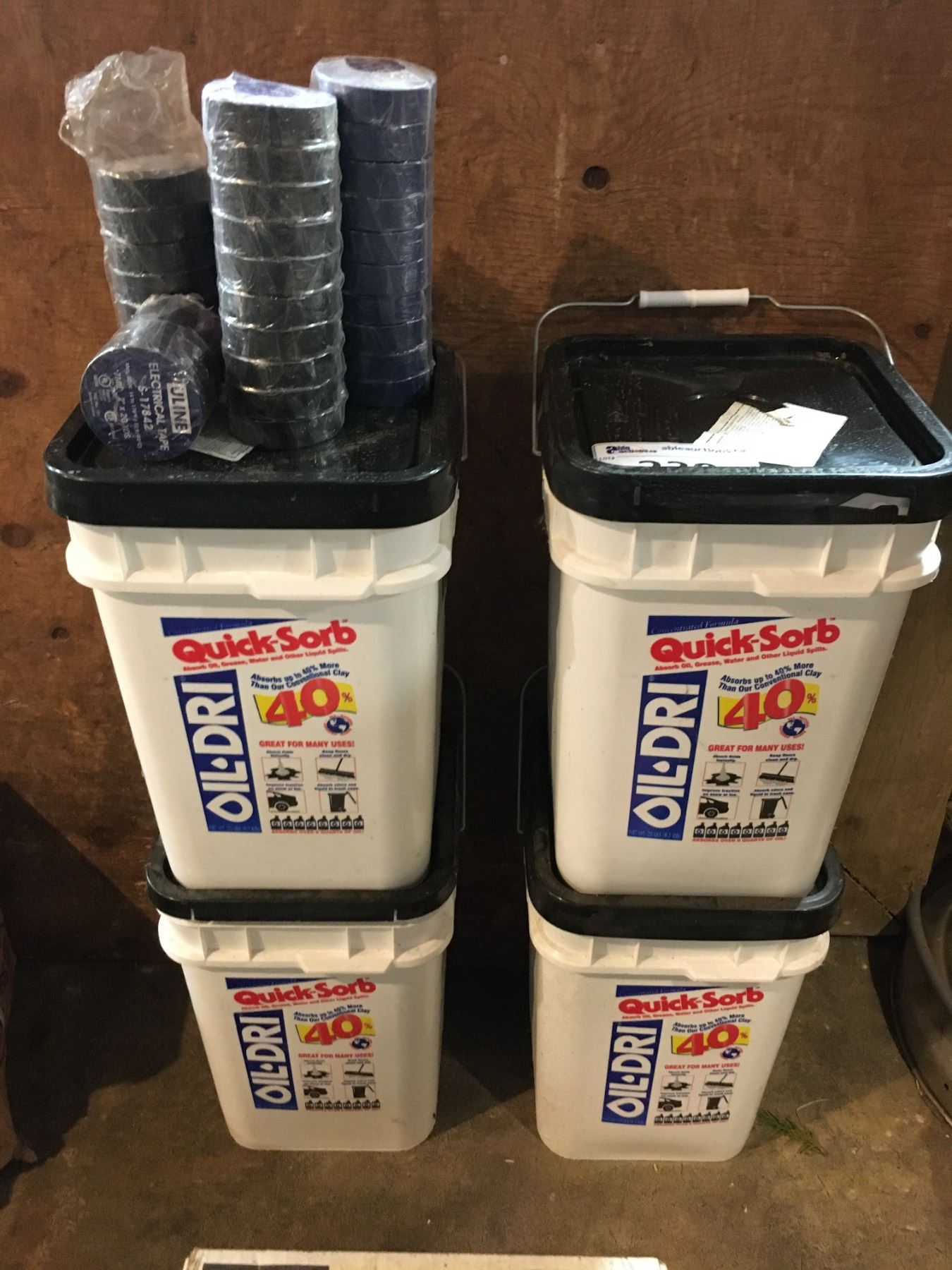 4 - 20 LBS. CONTAINERS OF QUICK-SORB OIL DRY ABSORBENT & 35 ROLLS  ELECTRICAL TAPE - Able Auctions