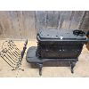 Image 1 : LOT OF 2 - CAST WOOD STOVE & METAL LOG HOLDER