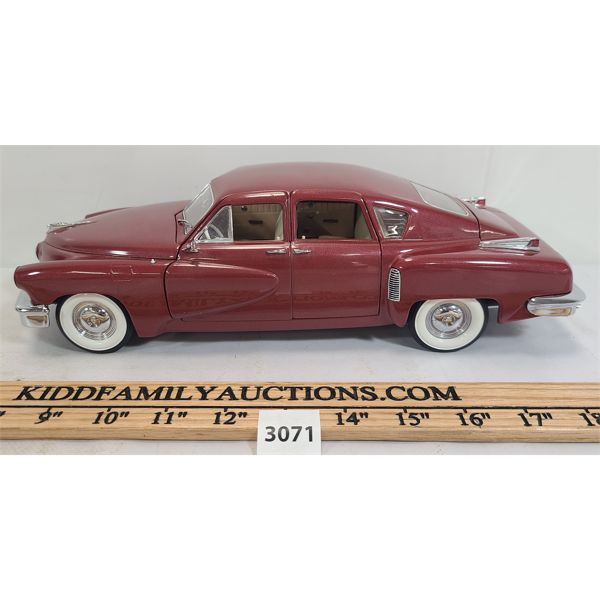KYOSHO DIE CAST TUCKER MODEL - 1:18 SCALE 